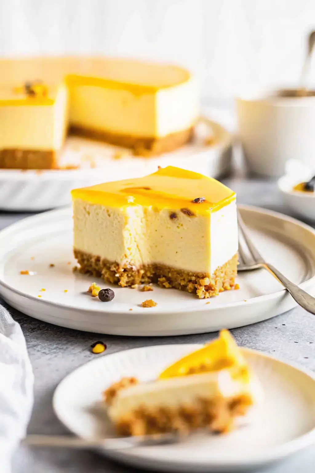 Slice of passion fruit cheesecake on a plate