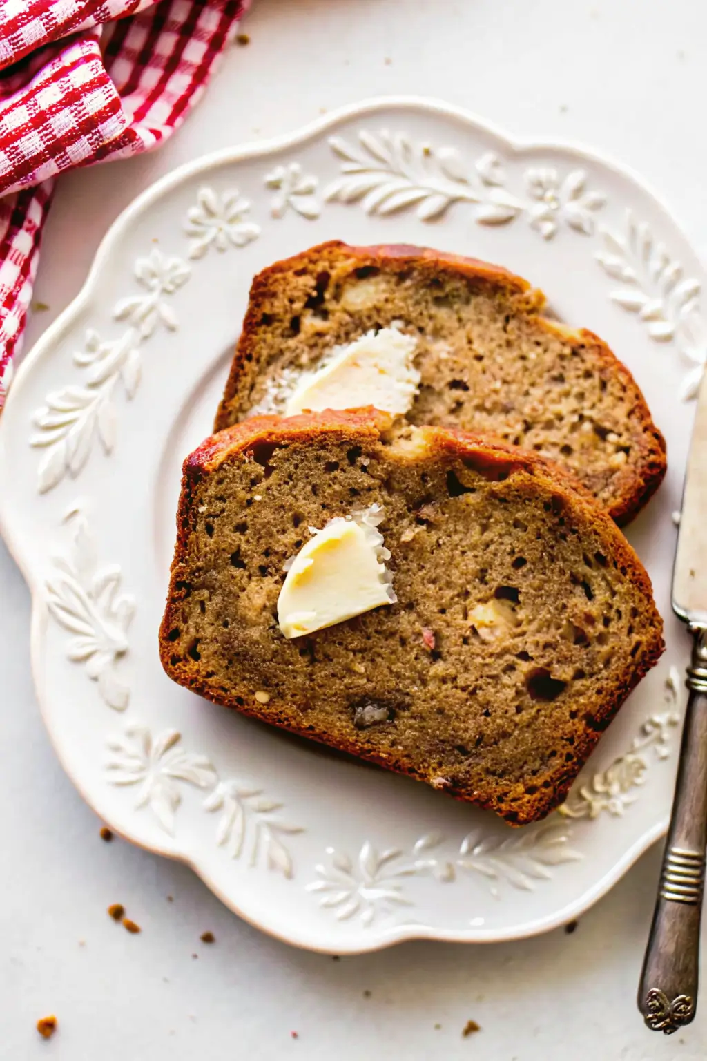 Sliced banana bread on plate