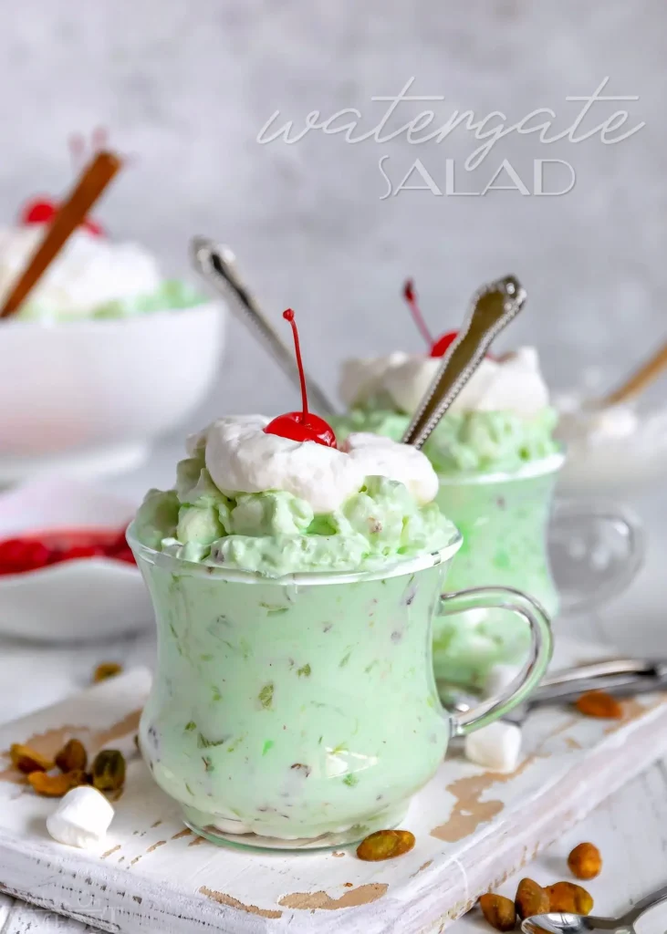 Creamy Watergate salad with pistachio pudding, pineapple, and marshmallows in a serving bowl