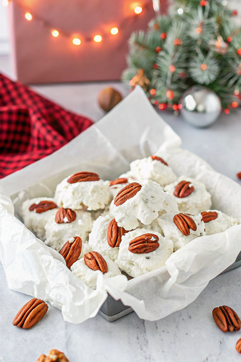 Pouring hot sugar syrup into egg whites to make candy