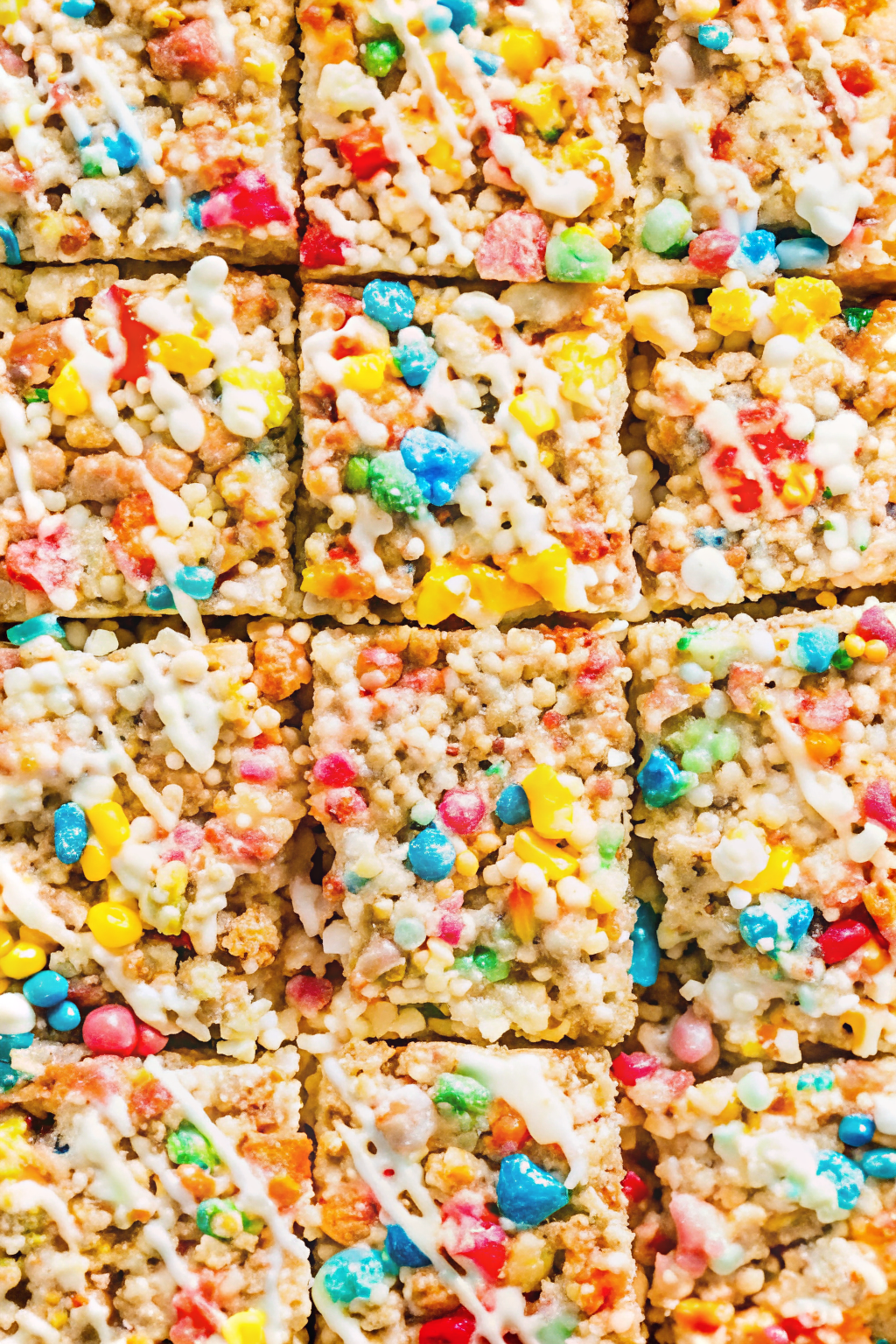 A stack of gooey Rice Krispie Treats with a marshmallow pull