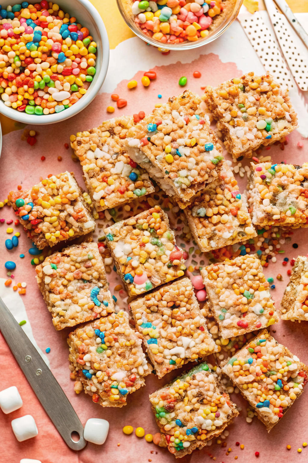 Gently pressing Rice Krispie mixture into a pan